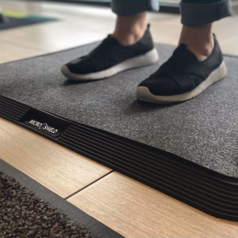Sanitizing Floor Mat Retains contamination and germs