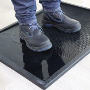 Sanitizing mats for shoes